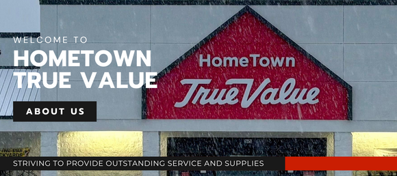 The storefront of HomeTown True Value on a snowy day. The image reads, 